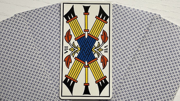 Tarot de Marseille : 7 de Bâtons et sa signification en tarologie